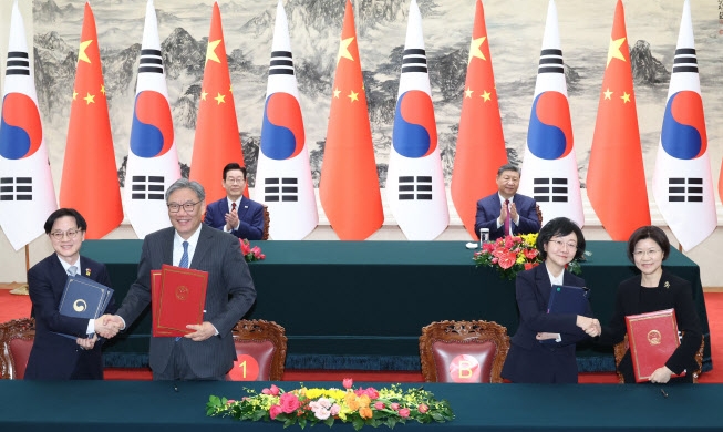 韩中在技术创新、环境等领域共签署14项谅解备忘录