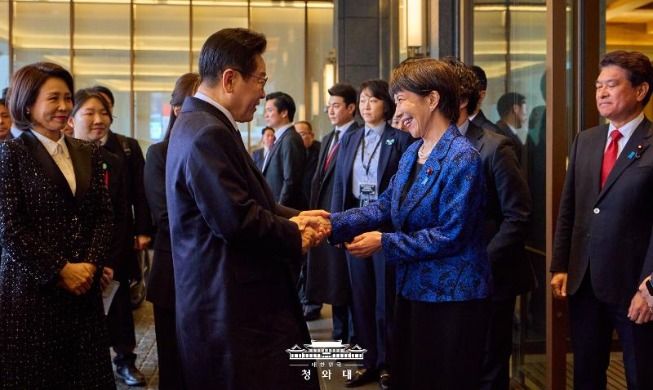 韩日首脑就历史遗留问题协商取得进展