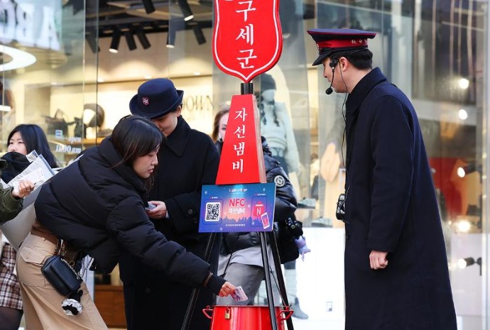 传递希望的“红色募捐锅”